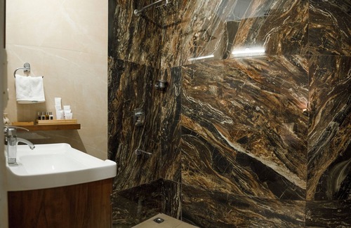 DLF City Hotel | Firebrick Garnet House