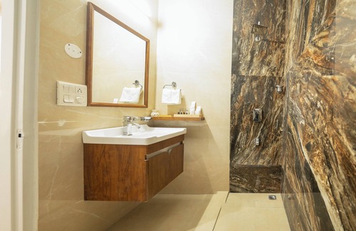 DLF City Hotel | Firebrick Garnet House