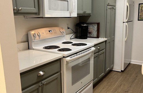 Saint Simons Heights Condo | First floor end unit freshly painted with Updated master bath, and kitchen.