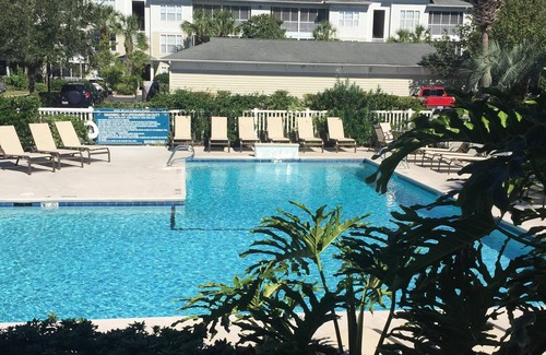 Saint Simons Heights Condo | First floor end unit freshly painted with Updated master bath, and kitchen.