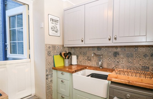 Rhydwyn Cottage | FISHERMAN'S COTTAGE, pet friendly, with open fire in Church Bay
