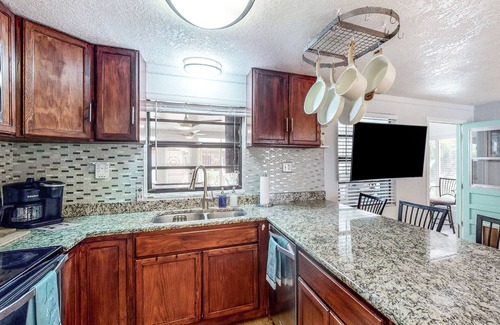Ruskin House | Fishing getaway with a pool, hot tub, game room, dock, and grill - dog-friendly
