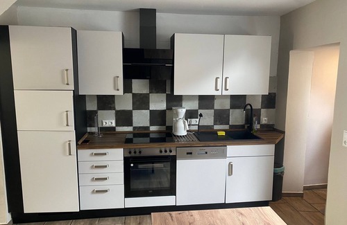 Brunsbuttel House | Fitters' house in the center near the industry