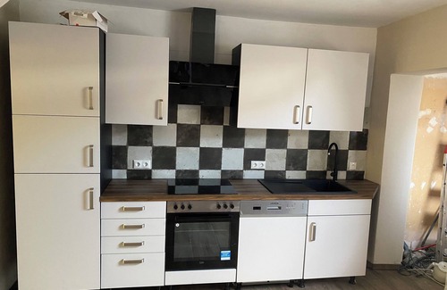 Brunsbuttel House | Fitters' house in the center near the industry