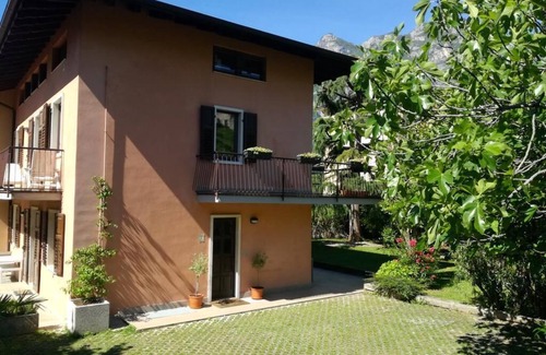 Riva del Garda Apartment | Flat with garden in quiet green neighborhood, 2 bikes, storage, private parking