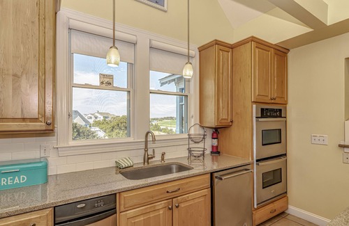 South Beach House | Flip Flops overlooks the signature hole of the golf course and has a beautiful view of the ocean!