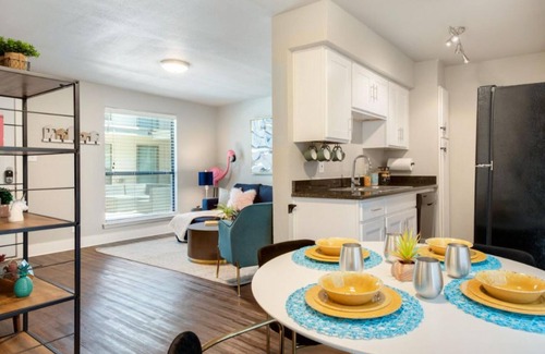 Austin Apartment | Flirty Flamingos l No Service Fees Poolside
