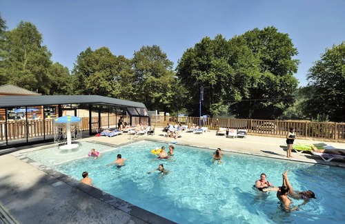Treignac House | Flower Camping La Plage * - Mobile home Comfort 29m2 (2 bedrooms) + TV + semi-covered terrace 18m2 6 people
