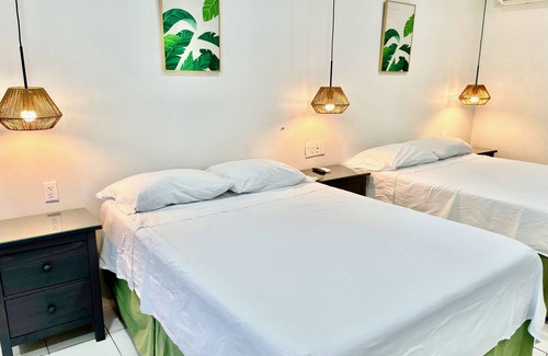 Montego Bay Hotel | Footsteps to Beach, AC, Fast Wi-Fi, Hot Water