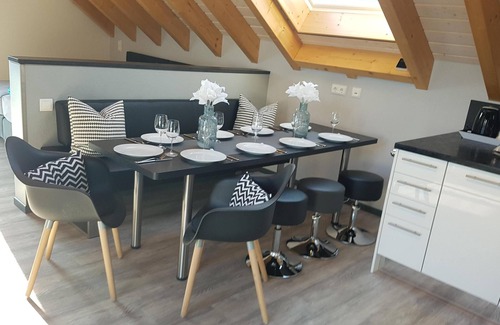 Bensheim Apartment | For the discerning: designer loft & roof balcony for 1-4 people. Near bathing lake