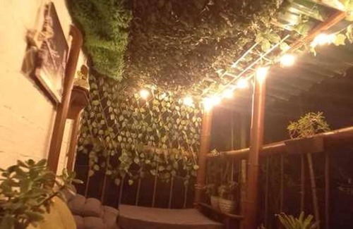 Medellin Apartment | Foresta House: ¡Pet-Friendly, with Forest View Terrace, Kitchen, & Comfort!