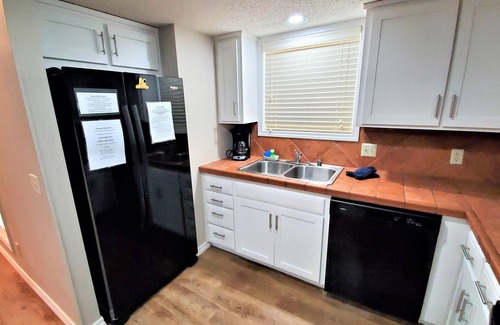 Holiday Island Condo | Four-bedroom condo with three KING BEDS, two twin beds. Three full baths.