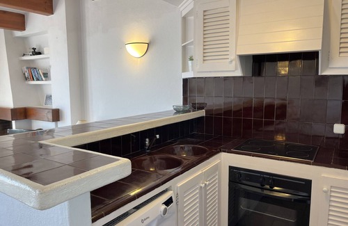 Fornells Apartment | Front sea line and with pool in Fornells