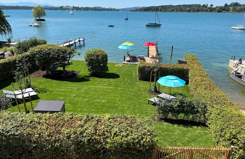 Gstadt Apartment | Garden Suite with cozy eat-in kitchen and lake view