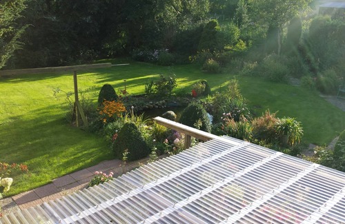 Boren Apartment | Garden view apartment in the farmhouse, large balcony in quiet nature 5min to the Schlei