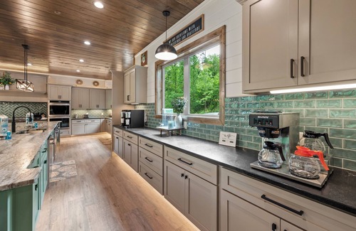 Gatlinburg Cabin | GATLINBURG LUXURY 21 BEDROOM! Elevator, Pool, Private Pavilion, Movie Theater.