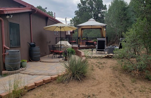 Tijeras House | Get away to the cool mountains and relax at the Cuddle Cottage! Double occupancy