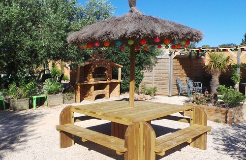 Argeles-sur-Mer Apartment | Gite saint julien in rez of garden with terrace swimming pool and games.