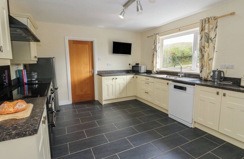 St Harmon Cottage | GLANYRAFON BUNGALOW, pet friendly, with hot tub in St Harmon