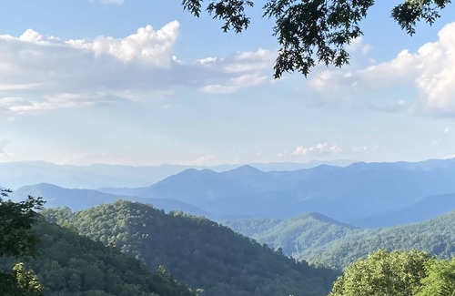 Sylva House | Glorious Mountain View’s, private serenity with fireplace and covered deck.