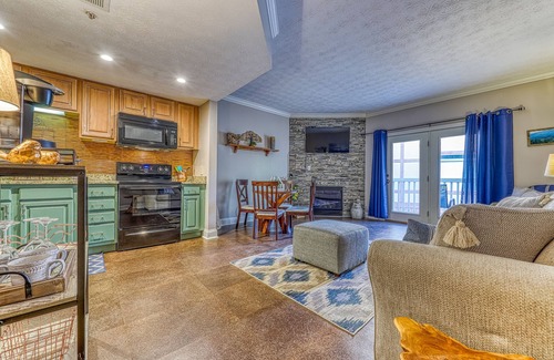 Pigeon Forge Apartment | Golf Course condo w/Free Attraction Tickets, fireplace, sauna, W/D & pool