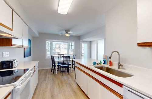 Buxton House | Gorgeous ocean-view townhouse with central AC, private W/D, patio, & pool access