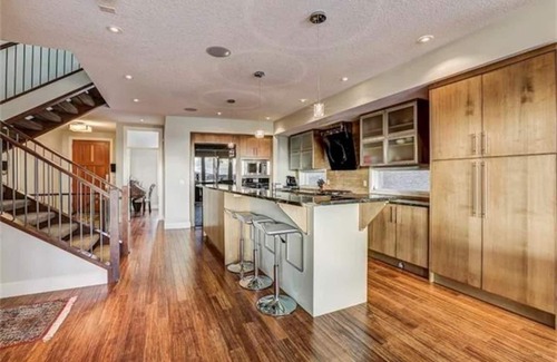 Bridgeland House | Gorgeous Skyline and Mountain View Property Refreshing Swim Spa Pool and Hot Tub
