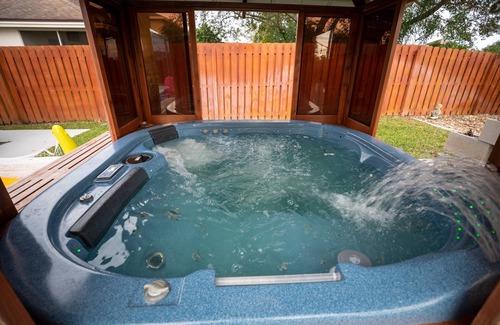 Tropic House | Gorgeous Urban Oasis W/hot Tub, Heated Pool And Private Movie Theater 3 Bedroom Home by RedAwning