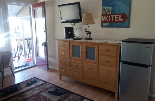 Laconia Resort | Great location with lake views ,pool and private beach.