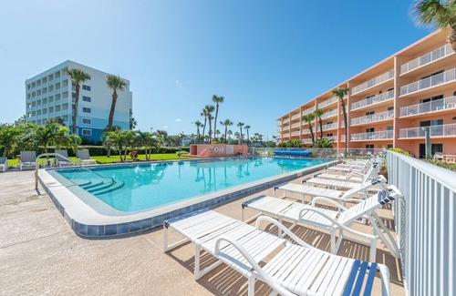 Port Canaveral Condo | Ground Floor Family Beach Escape – Pool, Patio & Walk to the Pier!