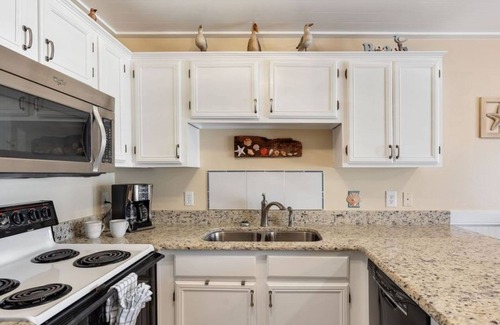 Avalon Beach Estates Condo | Ground Floor | Pool View | Steps to the Beach
