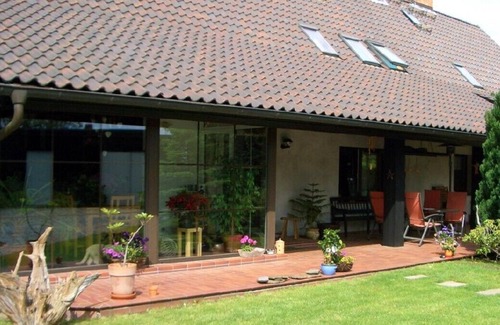 Parmen Apartment | Ground-level apartment with fireplace, edge of the Feldberg lake landscape, swimming lake on site