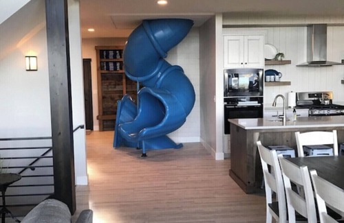 Fish Haven House | Group Vacation Spot with Private Beach Access, Pool, Hot Tub, and Indoor Slides