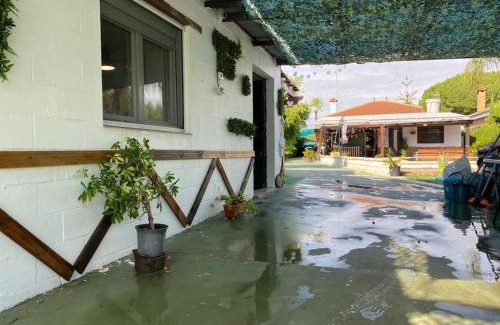 Dos Hermanas Apartment | Guest house with shared pool.