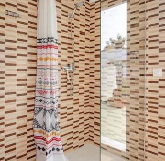 Dos Hermanas Apartment | Guest house with shared pool.