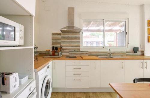 Dos Hermanas Apartment | Guest house with shared pool.