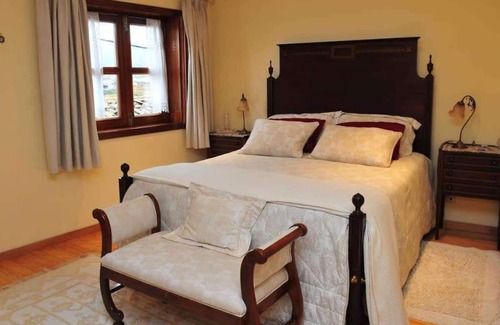 Aricera Apartment | GuestReady - Outros Tempos - Quarto da Geografia