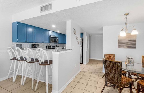 Biltmore Beach Condo | Gulf Front Paradise - Large Wraparound Balcony at Family Friendly Mariner West