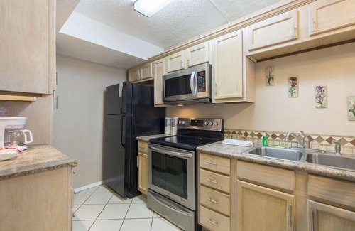 South Padre Island Condo | Gulfview II 211 - Modest digs with huge pool,BBQ pits;Near beach