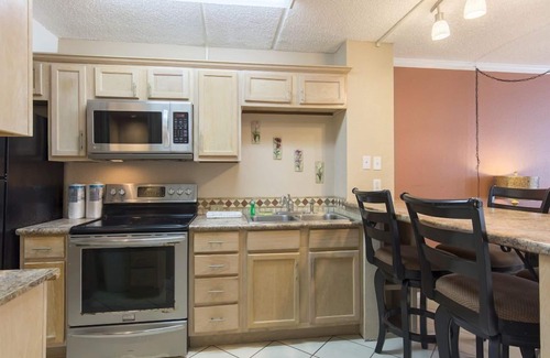South Padre Island Condo | Gulfview II 211 - Modest digs with huge pool,BBQ pits;Near beach