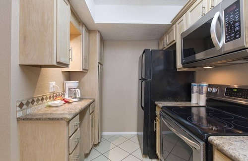 South Padre Island Condo | Gulfview II 211 - Modest digs with huge pool,BBQ pits;Near beach