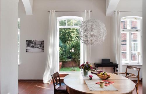 Lensahn Apartment | Gut Petersdorf Lensahn - ideal für Familien und Hunde - mit Kamin, Parkblick, Terrasse und eingezäuntem Garten