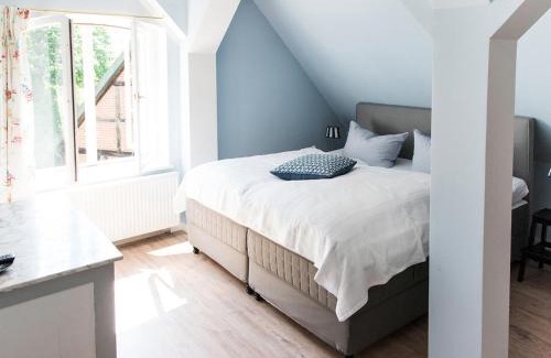 Lensahn Apartment | Gut Petersdorf Lensahn - ideal für Familien und Hunde - mit Kamin, Parkblick, Terrasse und eingezäuntem Garten