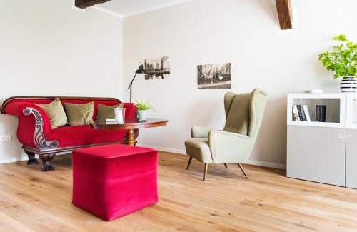 Lensahn Apartment | Gut Petersdorf Lensahn - ideal für Familien und Hunde - mit Kamin, Parkblick, Terrasse und eingezäuntem Garten