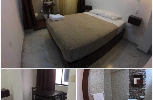 Trujillo Apartment | Habitación con entrada independiente, baño privado y cama queen
