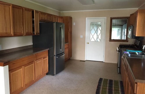 Ludington House | Hamlin Lake Vacation Retreat - 3 Bedroom Home With Lake View, Dock & Access