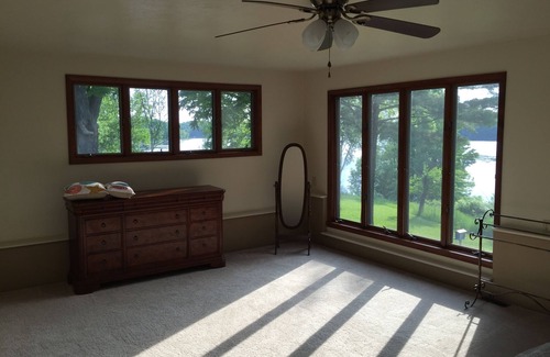 Ludington House | Hamlin Lake Vacation Retreat - 3 Bedroom Home With Lake View, Dock & Access