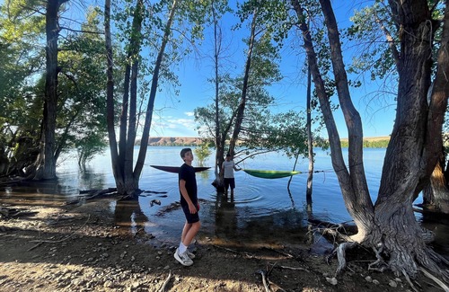 Swanlake House | Hammocks & kayaks with1 bed trailer, tiki torches, & tent space for extra guest