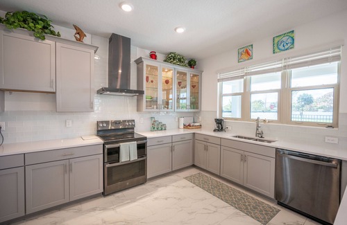 Melbourne Beach House | Harbor Island beach house with private and public pools.