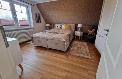 Albertsdorf Apartment | Haus-Fehmarn-am-Dorfteich-|-Wohnung-1-Sued